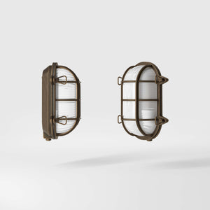 Nautical outdoor wall lamp in brass with protective grid and glass, maritime style for outdoor lighting by Ghidini 1849 - Finish: OBM Bronze Satin Matt Brass