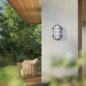 Nautical outdoor wall lamp in brass with protective grid and glass, maritime style for outdoor lighting by Ghidini 1849 - Finish: OBR Dark Bronze