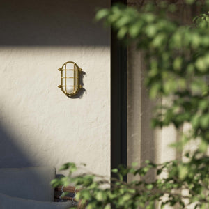 Nautical outdoor wall lamp in brass with protective grid and glass, maritime style for outdoor lighting by Ghidini 1849 - Finish: OLV Polished Brass