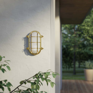 Nautical outdoor wall lamp in brass with protective grid and glass, maritime style for outdoor lighting by Ghidini 1849 - Finish: OLV Polished Brass