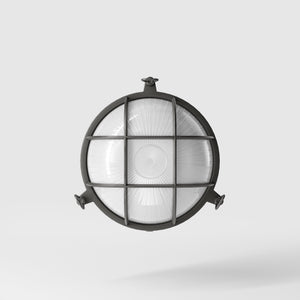 Round outdoor wall lamp in brass with protective grid and glass, marine style for outdoor lighting by Ghidini 1849 - Finish: OBR Dark Bronze