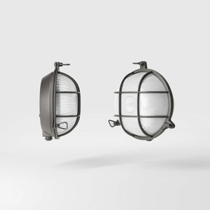 Round outdoor wall lamp in brass with protective grid and glass, marine style for outdoor lighting by Ghidini 1849 - Finish: OBR Dark Bronze