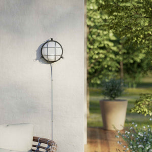 Round outdoor wall lamp in brass with protective grid and glass, marine style for outdoor lighting by Ghidini 1849 - Finish: OBR Dark Bronze