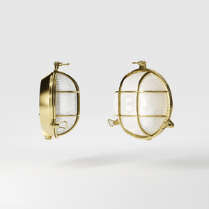 Round outdoor wall lamp in brass with protective grid and glass, marine style for outdoor lighting by Ghidini 1849 - Finish: OLV Polished Brass