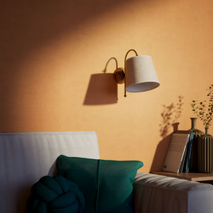 Brass wall lamp with grey linen shade, curved design, adjustable joint, indoor lighting by Ghidini 1849 - Finish: OAS Antique Brass