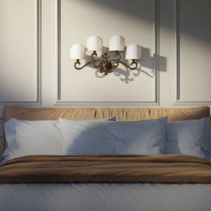Classical four-light brass wall lamp with central fleur-de-lis and decorative scrolls, white pleated shades, refined Italian design - Finish: OBM Bronze Satin Matt Brass