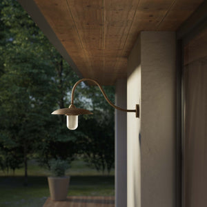 Vintage brass outdoor wall lamp with curved arm and protected glass by Ghidini 1849 - Finish: OAS Antique Brass