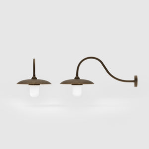 Vintage brass outdoor wall lamp with curved arm and protected glass by Ghidini 1849 - Finish: OBM Bronze Satin Matt Brass