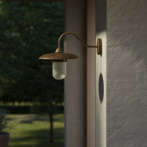 Retro brass outdoor wall lamp with wide shade and protected glass by Ghidini 1849 - Finish: OAS Antique Brass