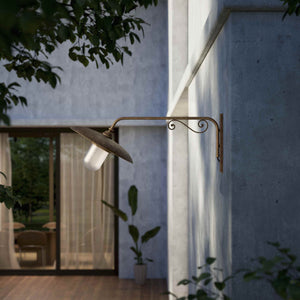 Brass outdoor wall lamp with decorative arm and protected glass by Ghidini 1849 - Finish: OAS Antique Brass