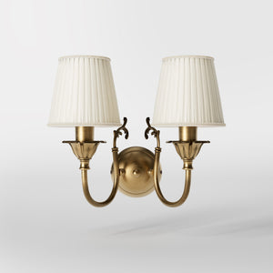 Classic wall lamp in brass with twin ivory white fabric lampshades, ideal for elegant interiors by Ghidini 1849 - Finish: OBS Bronze Satin Brass
