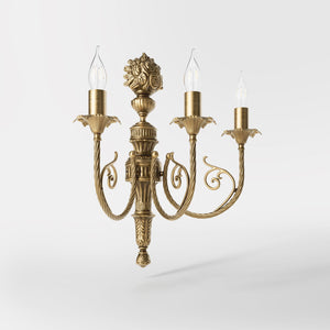 Baroque 3-light brass wall lamp with decorated scroll arms, floral motifs and decorative bouquet on top, Luigi XV style by Ghidini 1849 - Finish: OBS Bronze Satin Brass