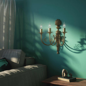 Baroque 3-light brass wall lamp with decorated scroll arms, floral motifs and decorative bouquet on top, Luigi XV style by Ghidini 1849 - Finish: OBS Bronze Satin Brass