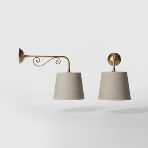 Classic brass wall lamp with scrollwork arm and linen-effect fabric shade European style Made in Italy design by Ghidini 1849 - Finish: OBS Bronze Satin Brass