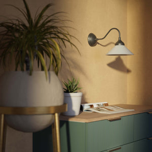 Vintage style wall lamp in brass with curved arm and white glass shade, Sofia collection of Italian craftsmanship by Ghidini 1849 - Finish: OBR Dark Bronze