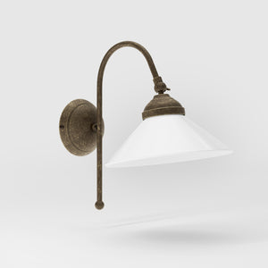 Wall lamp with curved brass arm and conical white glass shade, elegant Sofia design for versatile lighting by Ghidini 1849 - Finish: OAS Antique Brass
