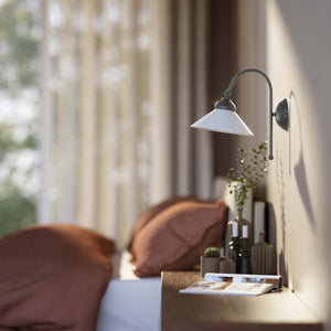 Wall lamp with curved brass arm and conical white glass shade, elegant Sofia design for versatile lighting by Ghidini 1849 - Finish: OBR Dark Bronze