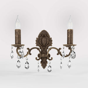 Baroque brass wall lamp with two lights and crystal pendants by Ghidini 1849 - Finish: OAS Antique Brass