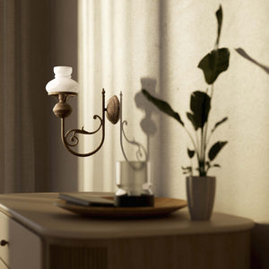 Classic wall lamp with white glass shade ribbed decorative dome and brass arm with scrolls by Ghidini 1849 - Finish: OAS Antique Brass