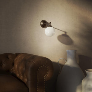 Brass wall lamp with white glass globe, vintage contemporary design for interiors by Ghidini 1849 - Finish: OBM Bronze Satin Matt Brass