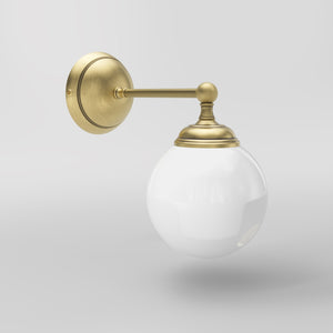 Brass wall lamp with white glass globe, vintage contemporary design for interiors by Ghidini 1849 - Finish: OBV Bronze Satin Light Brass
