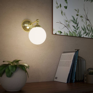 Brass wall lamp with white glass globe, vintage contemporary design for interiors by Ghidini 1849 - Finish: OLV Polished Brass