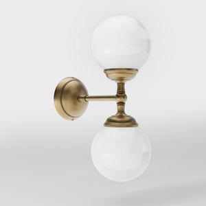 Art Deco wall sconce with two opal glass spheres and brass structure, classic and elegant Italian design for interior lighting - Finish: OBS Bronze Satin Brass