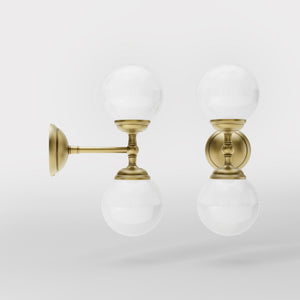 Art Deco wall sconce with two opal glass spheres and brass structure, classic and elegant Italian design for interior lighting - Finish: OBV Bronze Satin Light Brass