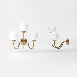 Brass wall lamp with three glossy white glass globes, elegant design, interior lighting by Ghidini 1849 - Finish: OBS Bronze Satin Brass
