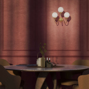 Brass wall lamp with three glossy white glass globes, elegant design, interior lighting by Ghidini 1849 - Finish: OLV Polished Brass