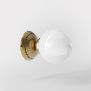 Art Deco wall light with glossy white glass sphere and circular brass structure classic and elegant Italian design - Finish: OBS Bronze Satin Brass