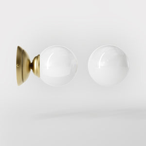 Art Deco wall light with glossy white glass sphere and circular brass structure classic and elegant Italian design - Finish: OBV Bronze Satin Light Brass