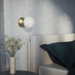 Art Deco wall light with glossy white glass sphere and circular brass structure classic and elegant Italian design - Finish: OBV Bronze Satin Light Brass