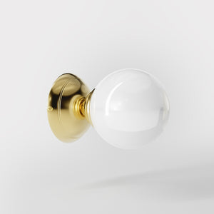 Art Deco wall light with glossy white glass sphere and circular brass structure classic and elegant Italian design - Finish: OLV Polished Brass