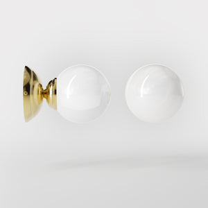 Art Deco wall light with glossy white glass sphere and circular brass structure classic and elegant Italian design - Finish: OLV Polished Brass