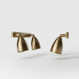 Brass wall lamp with two adjustable spots, perfect for living rooms, offices, and industrial-style interiors by Ghidini 1849 - Finish: OBS Bronze Satin Brass