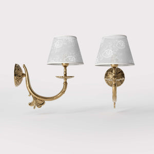 Classical brass wall lamp with decorated white fabric shade, curved arm and ornamental rosette, traditional floral details - Finish: OBS Bronze Satin Brass