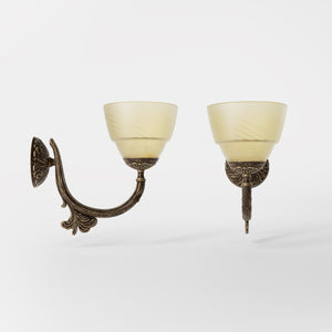 Art Nouveau brass wall lamp with floral decorated arm and frosted glass diffuser with geometric diamond pattern by Ghidini 1849 - Finish: OAS Antique Brass