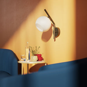 Brass wall lamp with spherical opal glass diffuser, modern and geometric design, perfect for elegant and contemporary interiors by Ghidini 1849 - Finish: OBM Bronze Satin Matt Brass