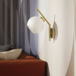 Brass wall lamp with spherical opal glass diffuser, modern and geometric design, perfect for elegant and contemporary interiors by Ghidini 1849 - Finish: OBV Bronze Satin Light Brass
