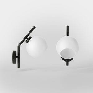 Brass wall lamp with spherical opal glass diffuser, modern and geometric design, perfect for elegant and contemporary interiors by Ghidini 1849 - Finish: ONO Matt Black