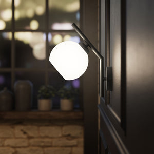 Brass wall lamp with spherical opal glass diffuser, modern and geometric design, perfect for elegant and contemporary interiors by Ghidini 1849 - Finish: ONO Matt Black