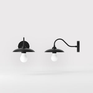 Vintage brass wall lamp with curved arm, ideal for sophisticated interiors by Ghidini 1849 - Finish: ONO Matt Black