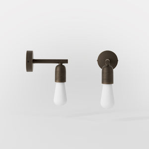 Minimalist brass wall lamp for interiors, contemporary and essential style, perfect for homes, offices, and commercial spaces by Ghidini 1849 - Finish: OBM Bronze Satin Matt Brass