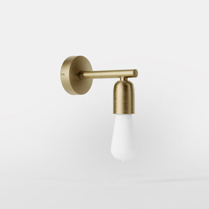 Minimalist brass wall lamp for interiors, contemporary and essential style, perfect for homes, offices, and commercial spaces by Ghidini 1849 - Finish: OBV Bronze Satin Light Brass