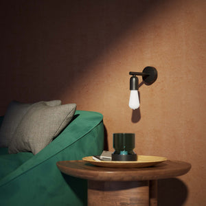 Minimalist brass wall lamp for interiors, contemporary and essential style, perfect for homes, offices, and commercial spaces by Ghidini 1849 - Finish: ONO Matt Black