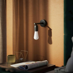 Minimalist brass wall lamp for interiors, contemporary and essential style, perfect for homes, offices, and commercial spaces by Ghidini 1849 - Finish: ONO Matt Black