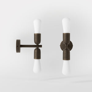 Modern brass wall sconce with dual light, minimalist and refined design, ideal for homes, hotels, and boutiques by Ghidini 1849 - Finish: OBM Bronze Satin Matt Brass