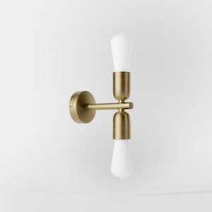 Modern brass wall sconce with dual light, minimalist and refined design, ideal for homes, hotels, and boutiques by Ghidini 1849 - Finish: OBV Bronze Satin Light Brass
