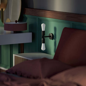 Modern brass wall sconce with dual light, minimalist and refined design, ideal for homes, hotels, and boutiques by Ghidini 1849 - Finish: ONO Matt Black